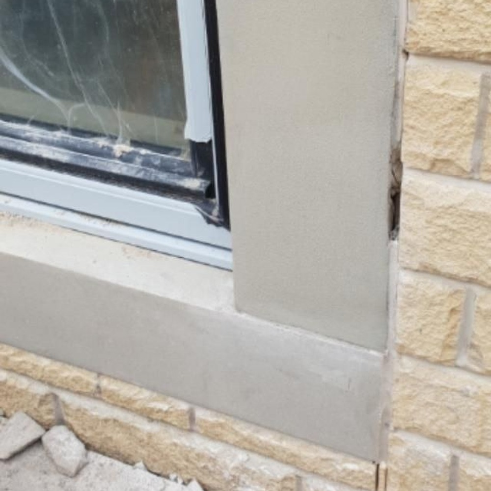 Stone window reveal repair — after