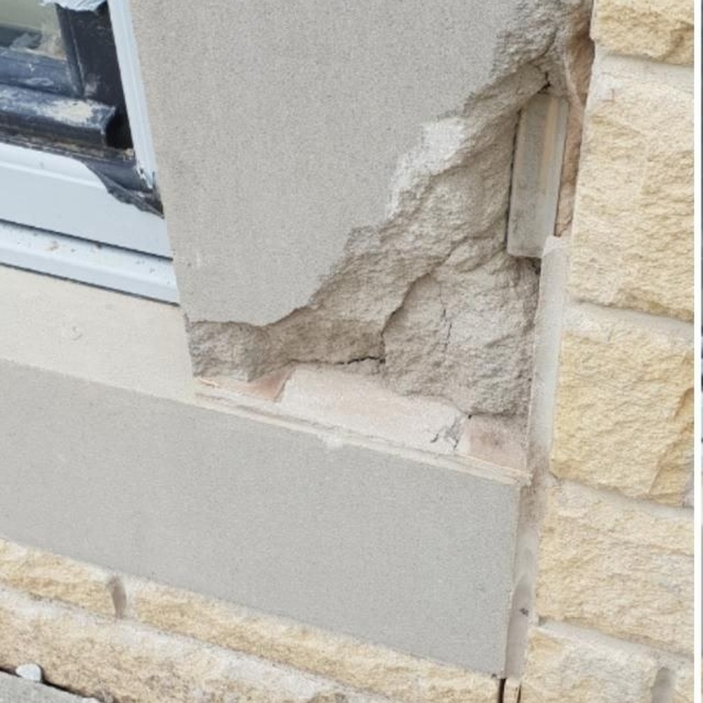 Stone window reveal repair — before